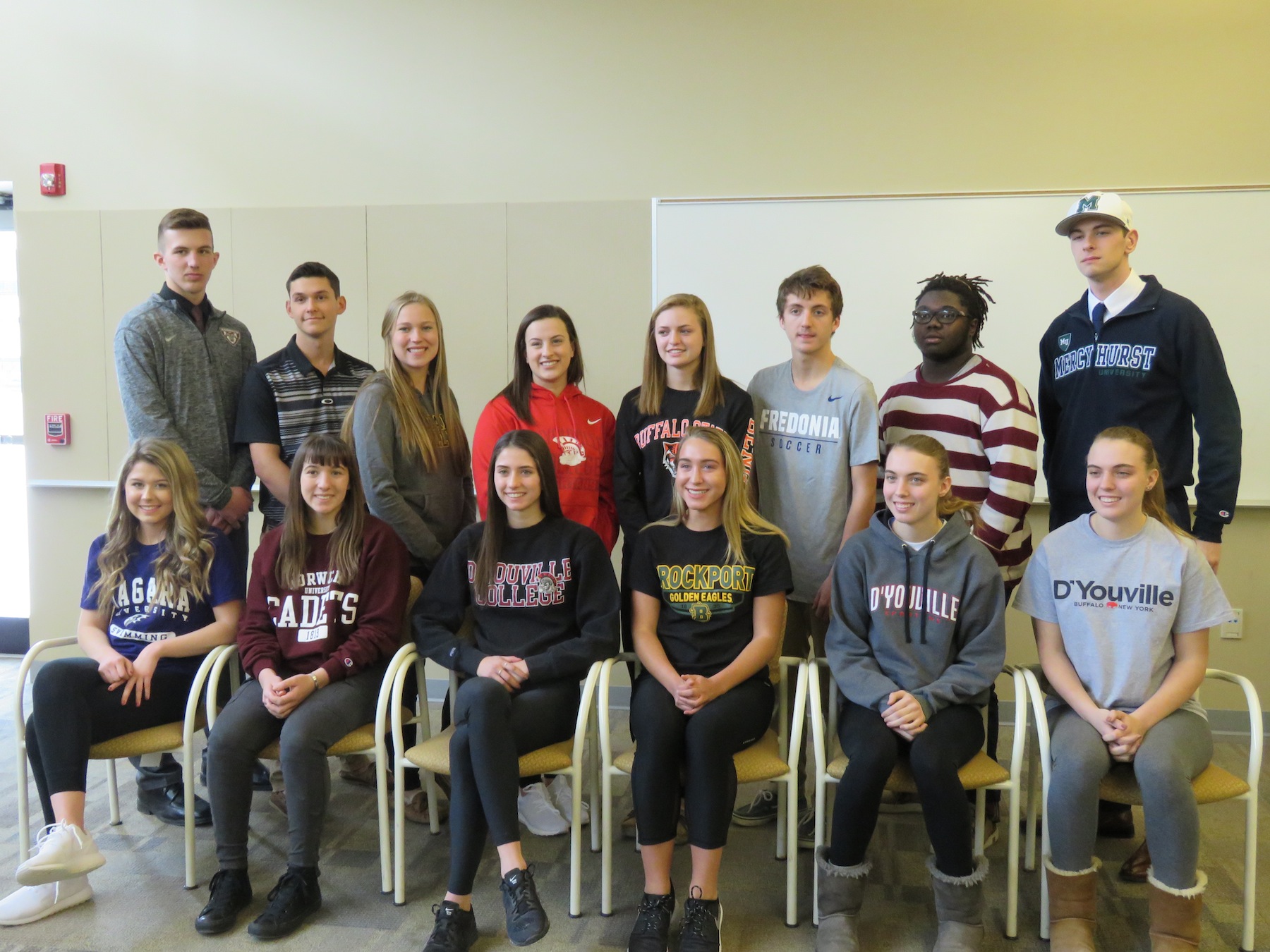 Niagara-Wheatfield student-athletes signed their letters of intent to continue their athletic careers in college. Front row, left to right; Jenna Wagoner, Sarah Carls, Tiffany Cristofanelli, Erin Wegrzyn, Carly Milleville and Mikaela Milleville. Back row, left to right; Zack Belter, Kyle Stenzel, Hallie Dworzanski, Julia Cimino, Sydney Watters, Joseph Gioannini, Josh Brown and James Filippelli. (Photo by David Yarger)  
